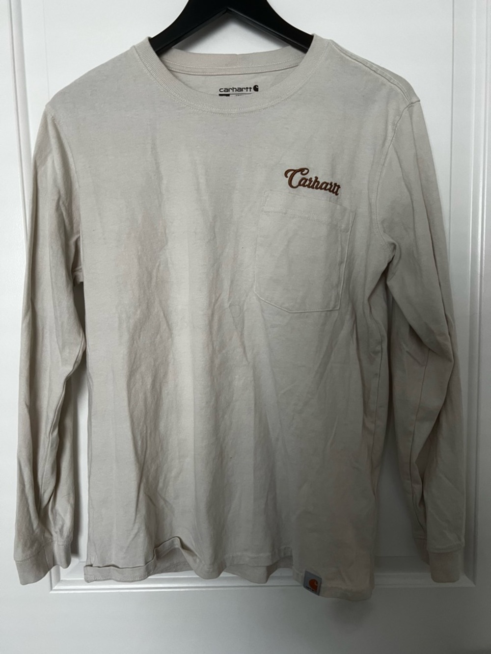 Carhartt Long Sleeve Pocket Tee in Light Cream with Brown Logo